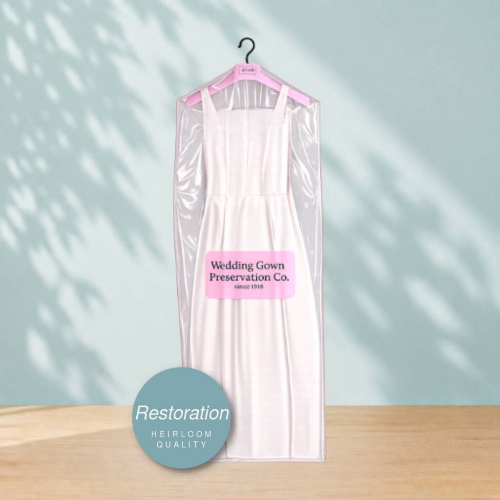 Wedding dress cleaning and restoration, returned on a premium hanger in a garment bag