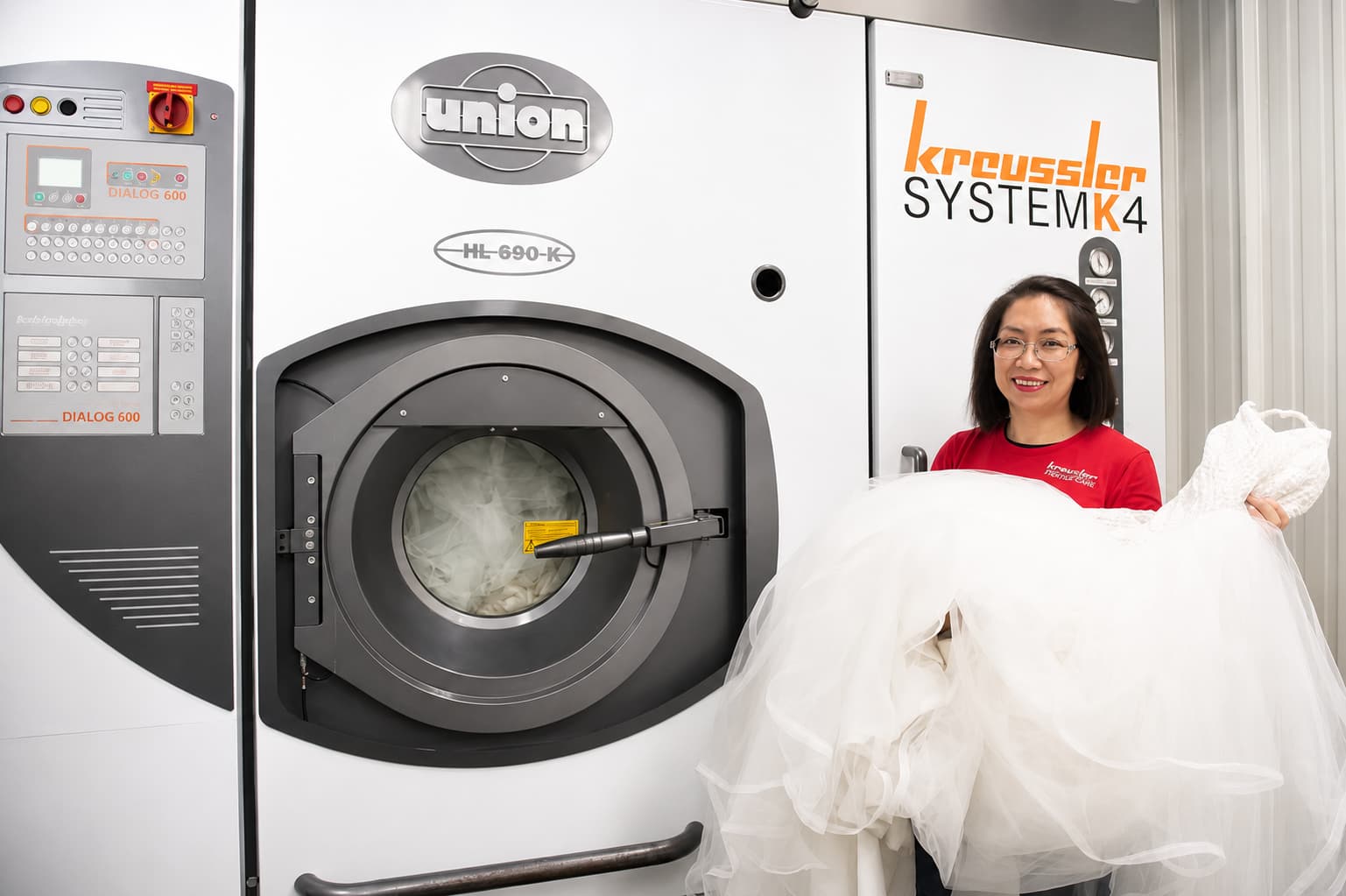 A wedding dress being cleaned with the SYSTEMK4 museum-quality cleaning system