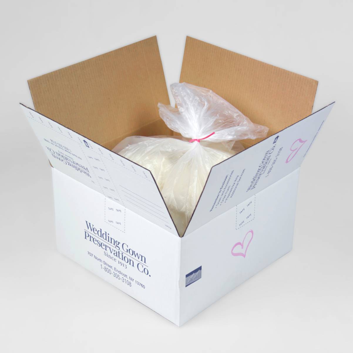 Packing the dress into the prepaid shipping kit